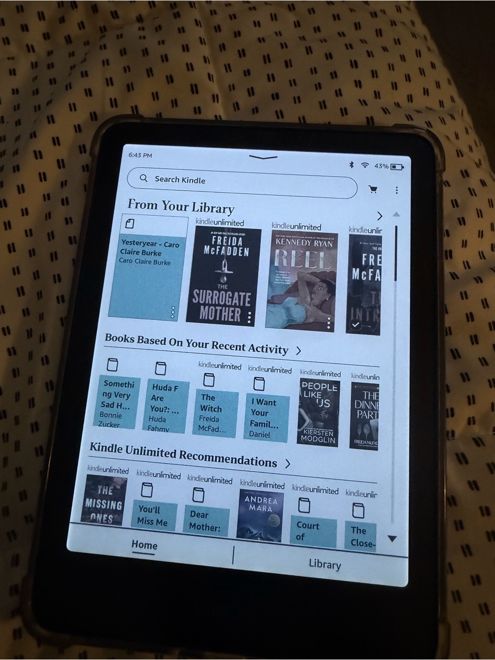 Amazon Kindle e-Reader in black with black case